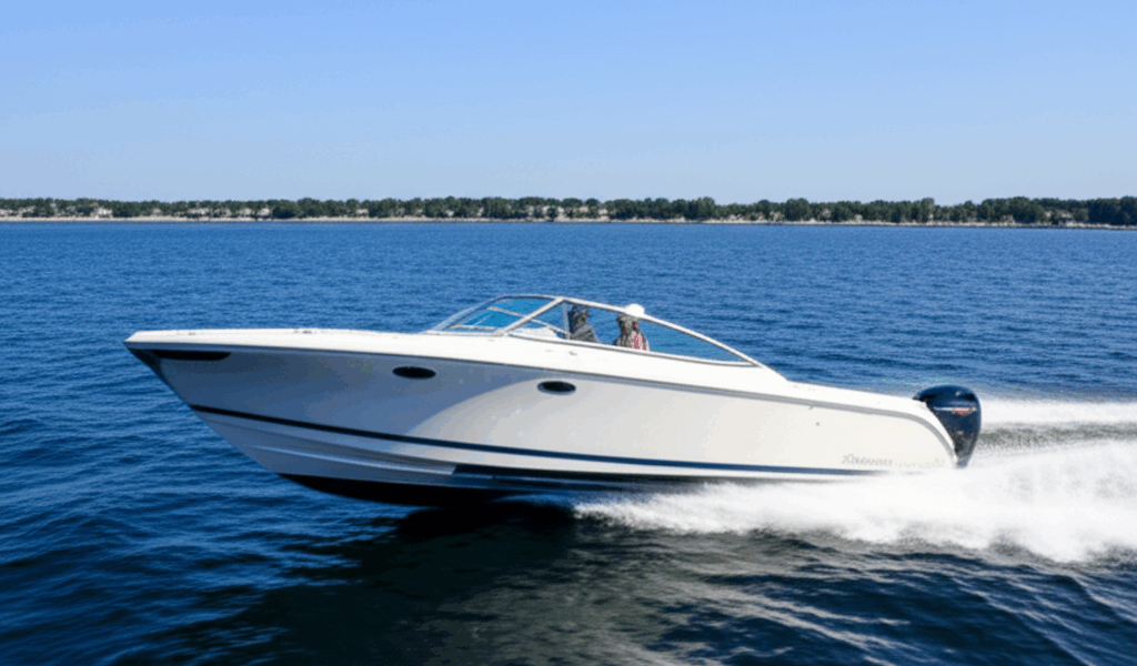 Single engine powerboat cruising on water