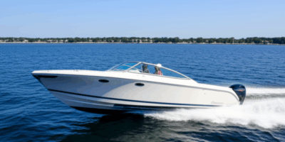 Single engine powerboat cruising on water